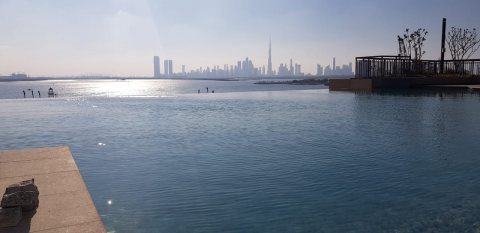 تملك شقة من اعمار باطلالات ساحرة على برج خور دبي ب950الف تقسيط 3