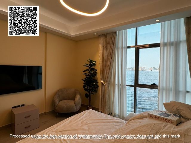 بمقدم 10%  إمتلك غرفة وصالة بإطلالة مائية على خور عجمان  7