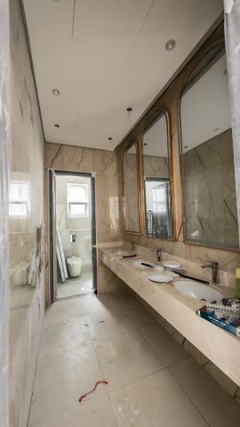 للبيع فيلا أول ساكن في الشارقة تقع في منطقة الحوشي ملبسة بحجر 4