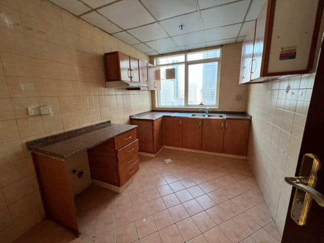 A 2-bedroom apartment with a living room in Al Khan area. 2