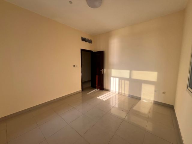 A 2-bedroom apartment with a living room in Al Khan area. 4