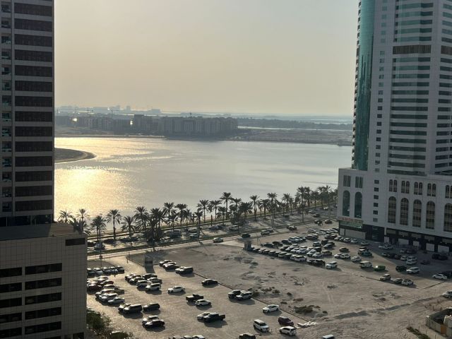 A 2-bedroom apartment with a living room in Al Khan area. 5